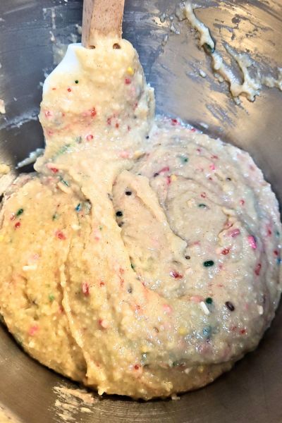 Christmas Funfetti Bread batter in a bowl 